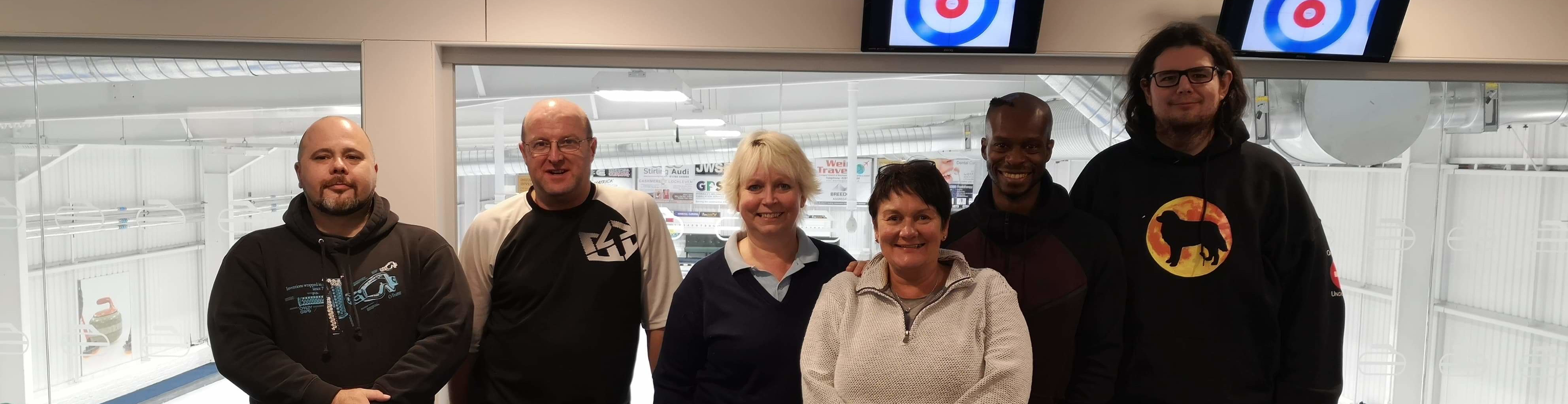 Cupar Bowmen members at Kinross Curling club for sports crossover weekend.
